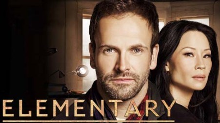 CBS Elementary displaying Jonny Lee Miller as Holmes and Lucy Lui as Dr. Joan Watson (CBS 2012)